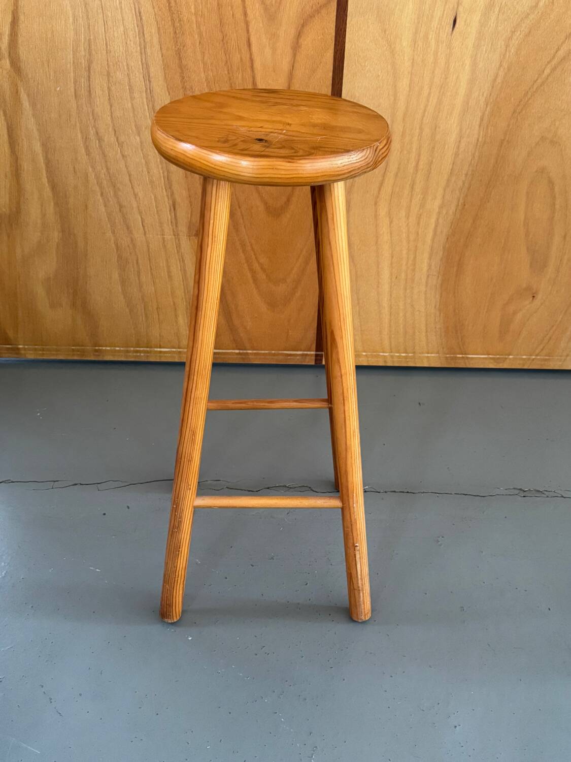 High wooden stool