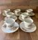 Vintage set of 7 cups and saucers in porcelain with defects.