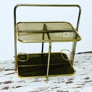 Golden tubing bar and smoked glass top circa 60/70