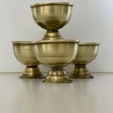 4 golden brass egg cups