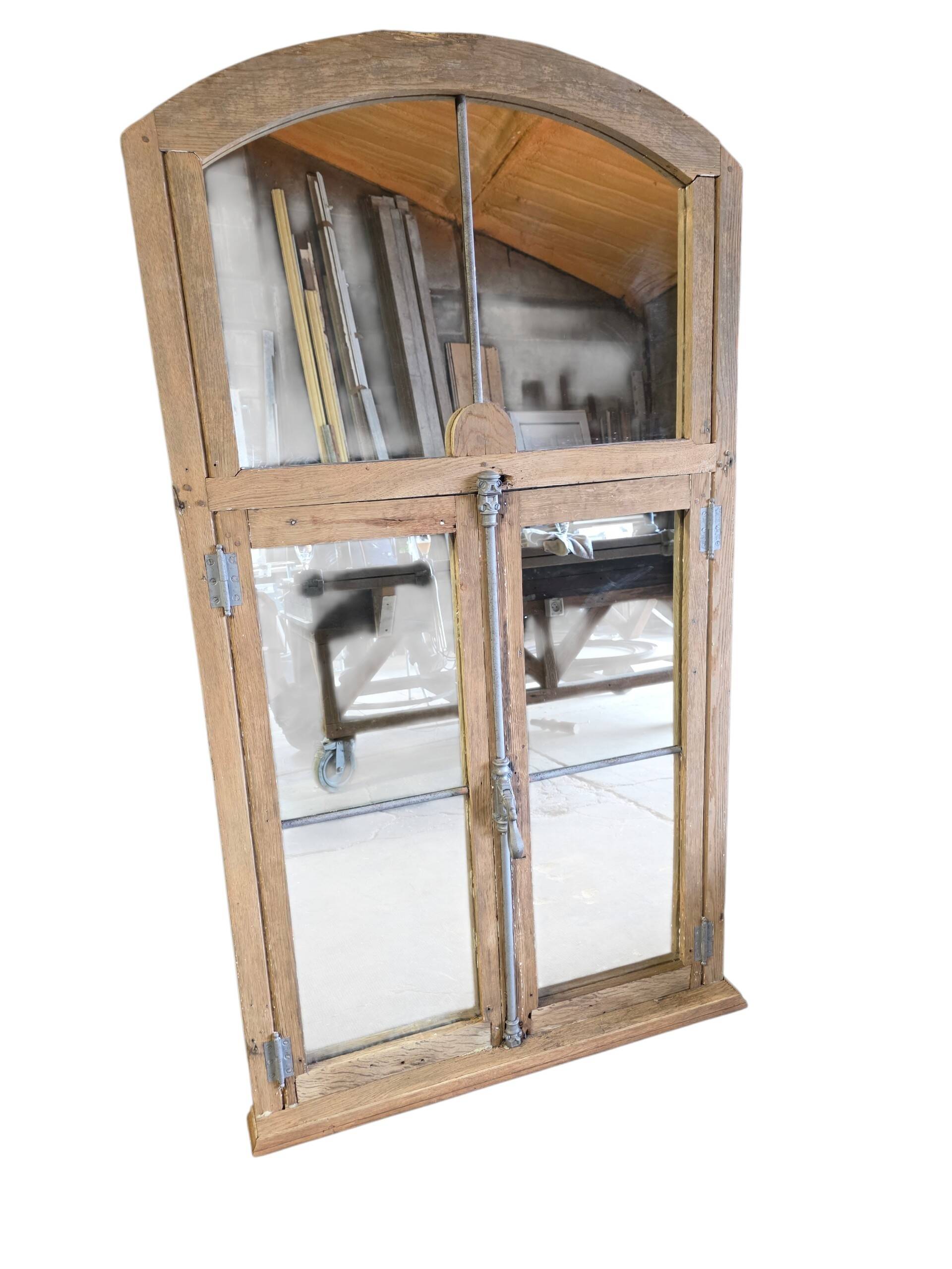 Eighteenth-century oak window mirror.