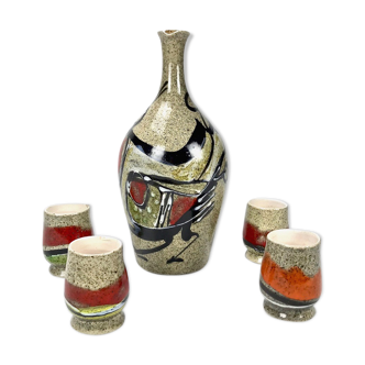 Liquor or sandstone sake service with abstract patterns