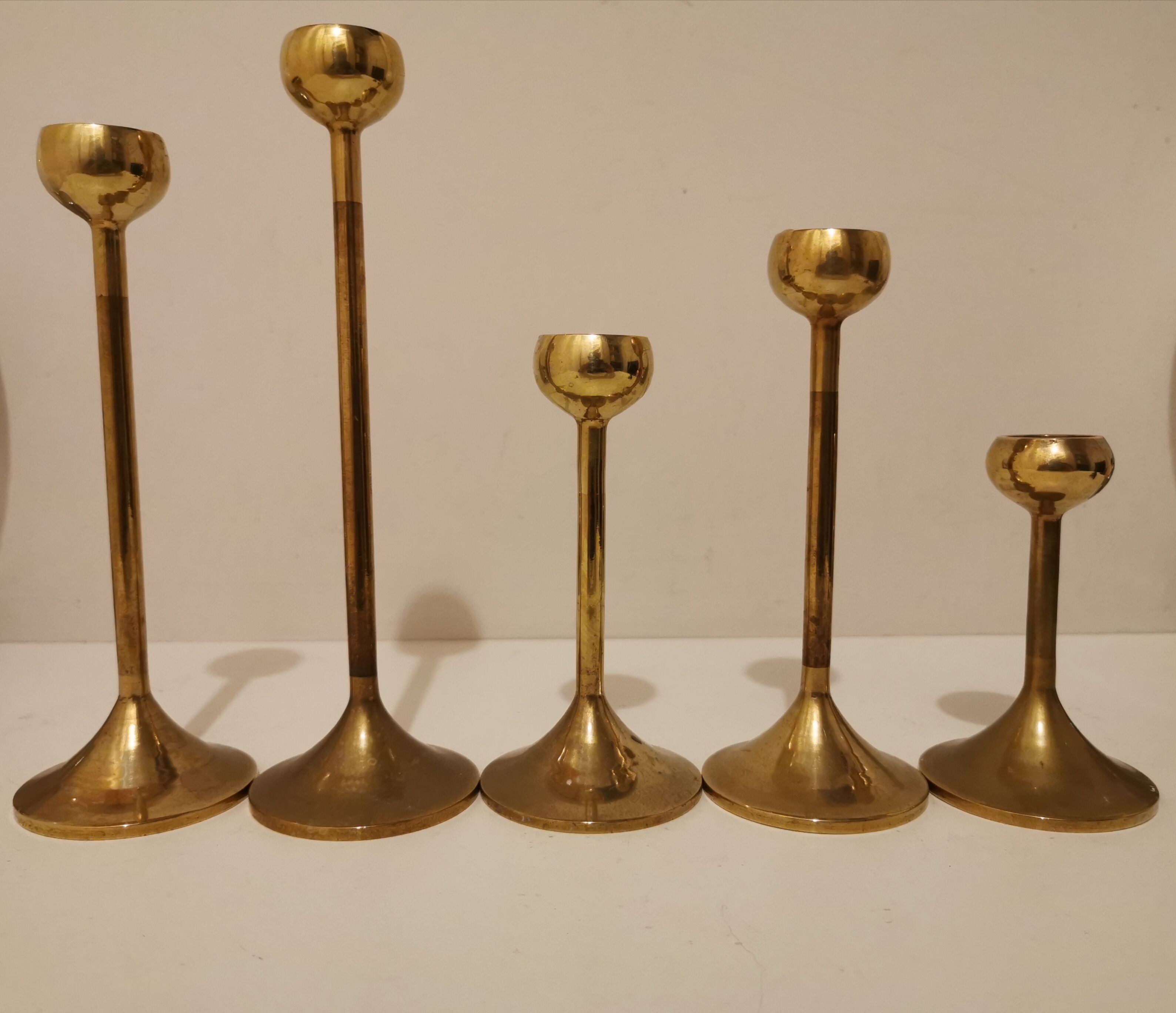 Set of 5 brass candlesticks from the 70s