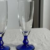 Set of 6 blue-footed champagne flutes; 3 pairs of designs.