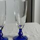 Set of 6 blue-footed champagne flutes; 3 pairs of designs.