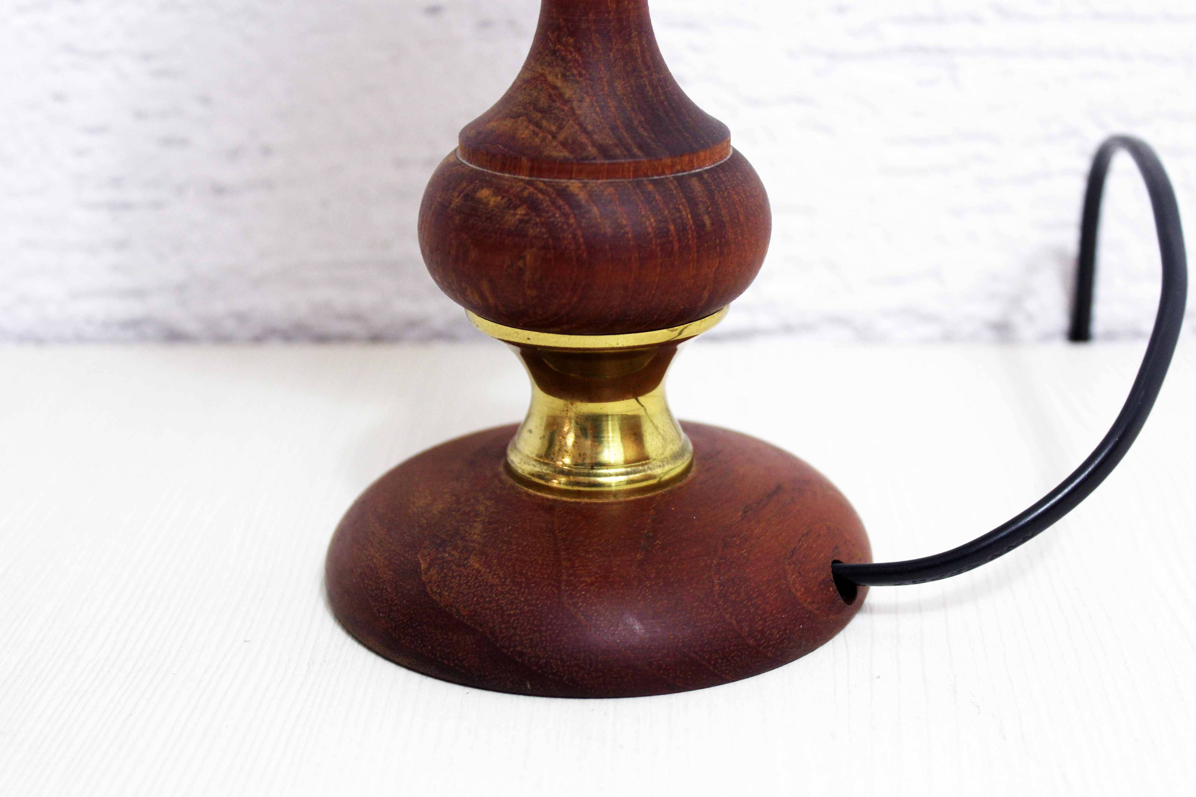 Turned wood and pink glass lamp