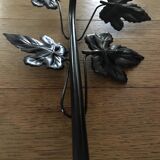 Art-deco style wall lamp with black metal support and foliage and glass paste tulip
