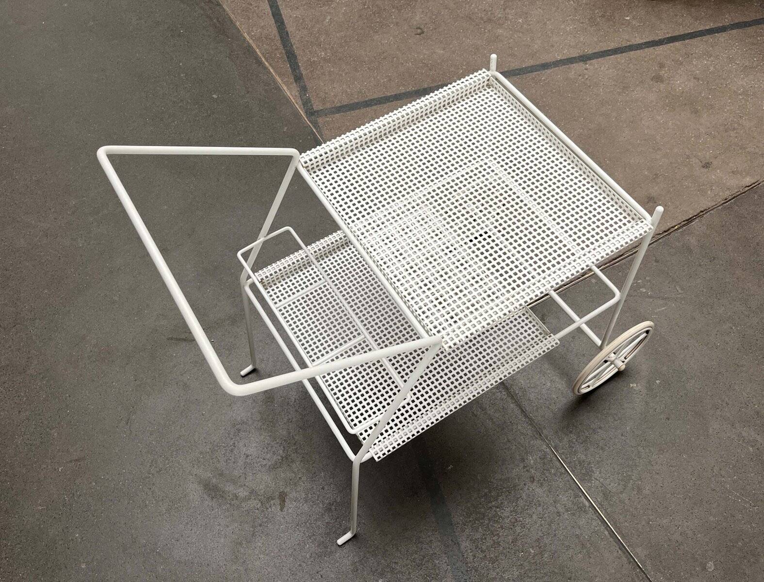 Mid-century modern minimalist perforated metal bar cart from the 1960s.