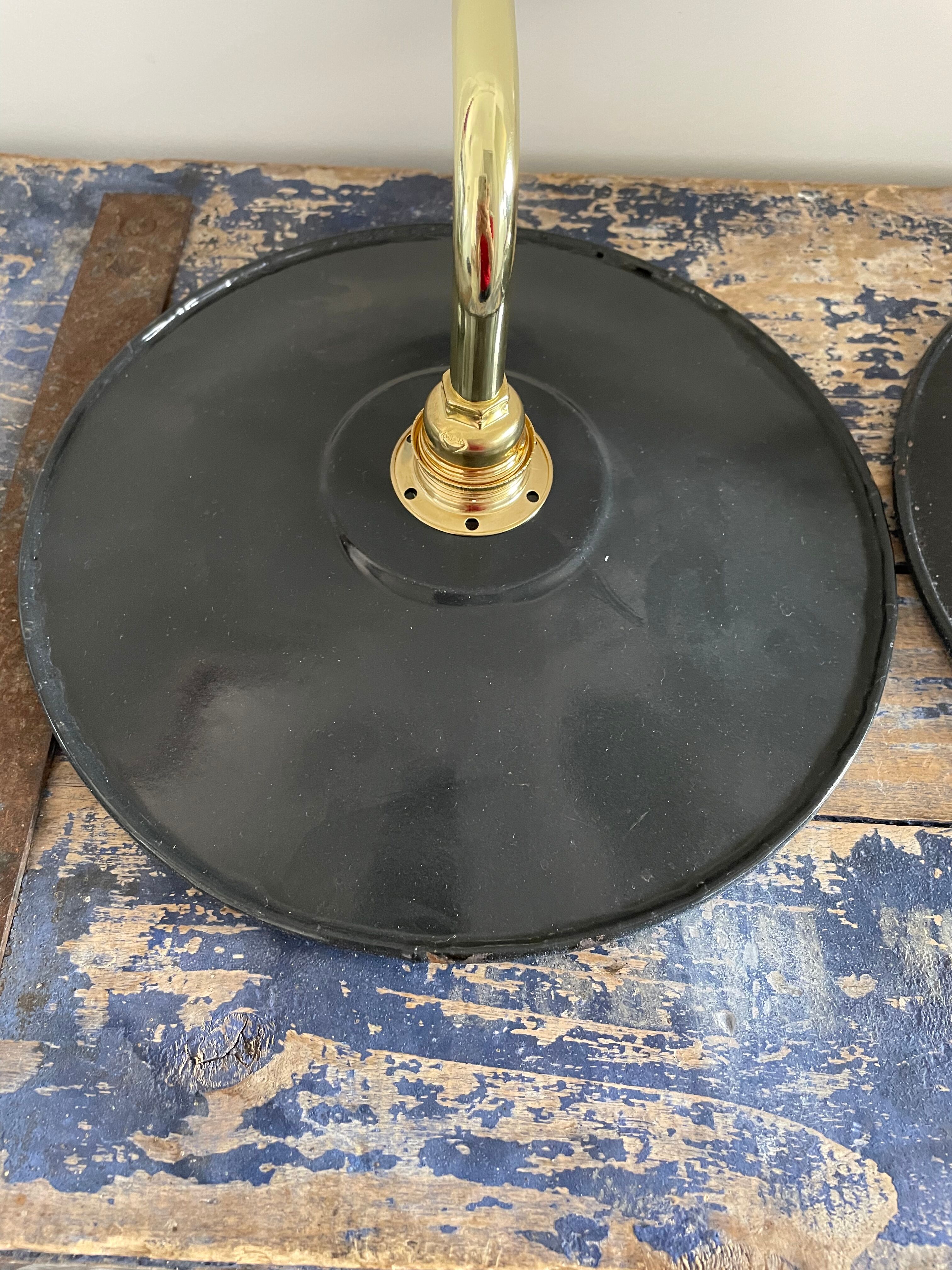 Pair of black enamelled sheet metal wall lamps electrified to nine