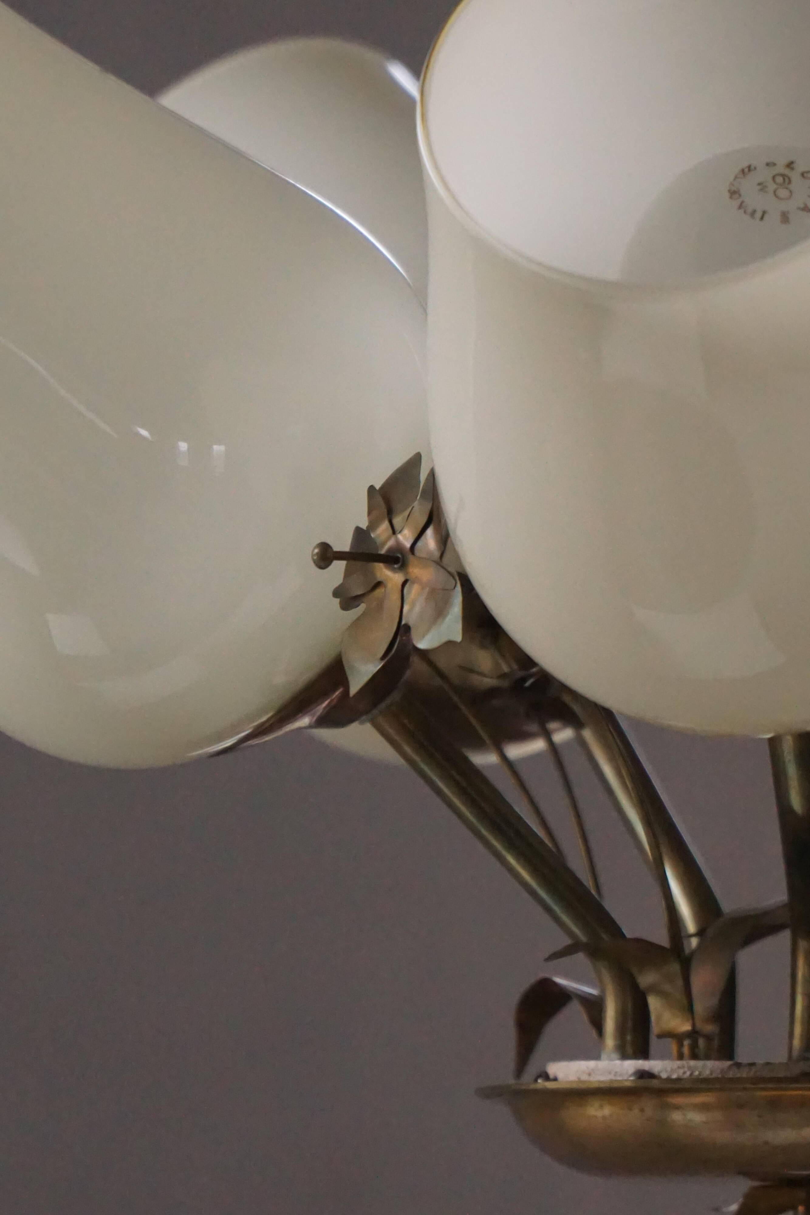 Five-branch brass and glass chandelier by Paavo Tynell for Idman OY Finland, 1940s.