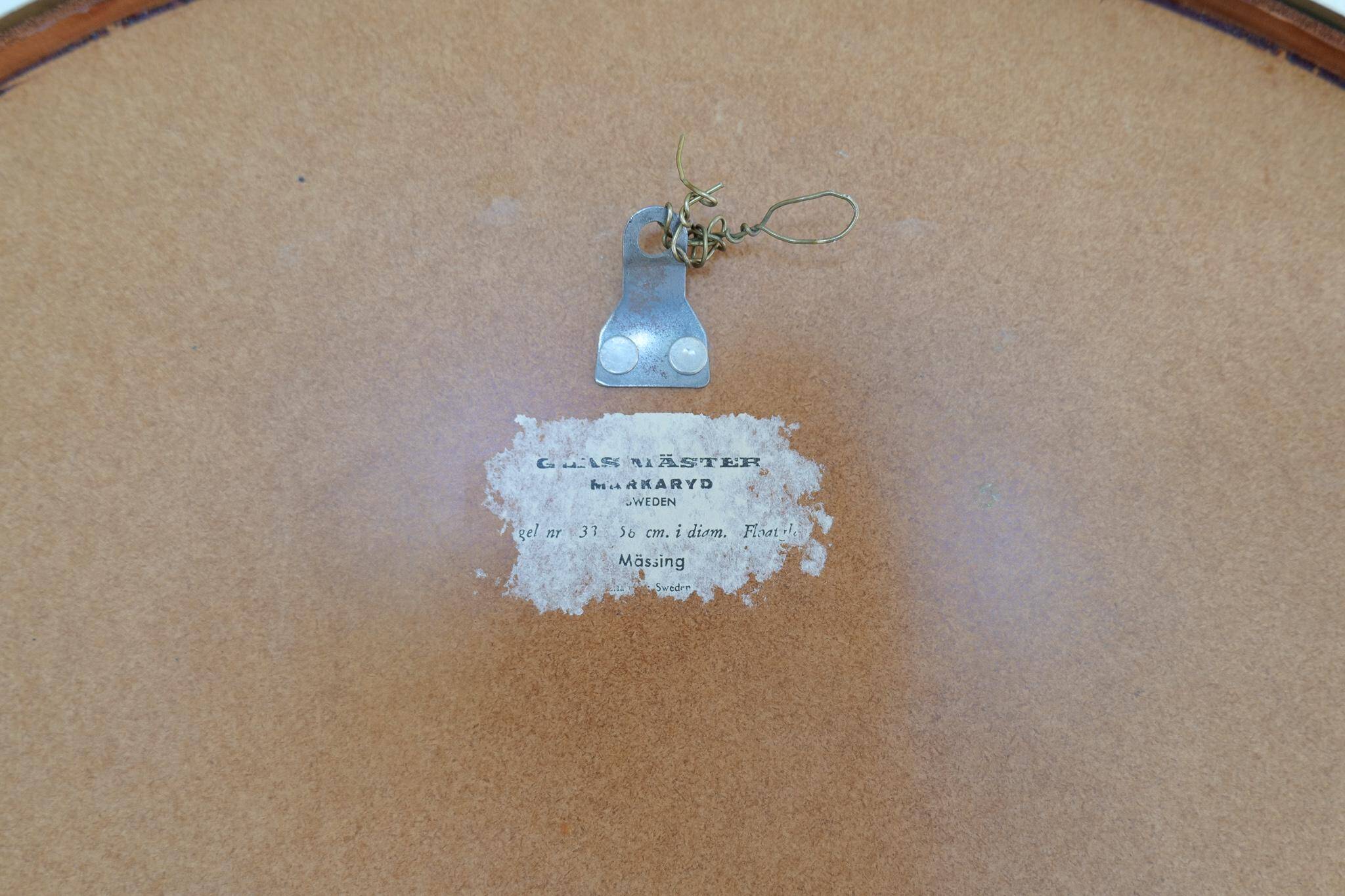 Modern round brass mirror from the mid-century by Glasmäster in Markaryd, Sweden, 1960s.