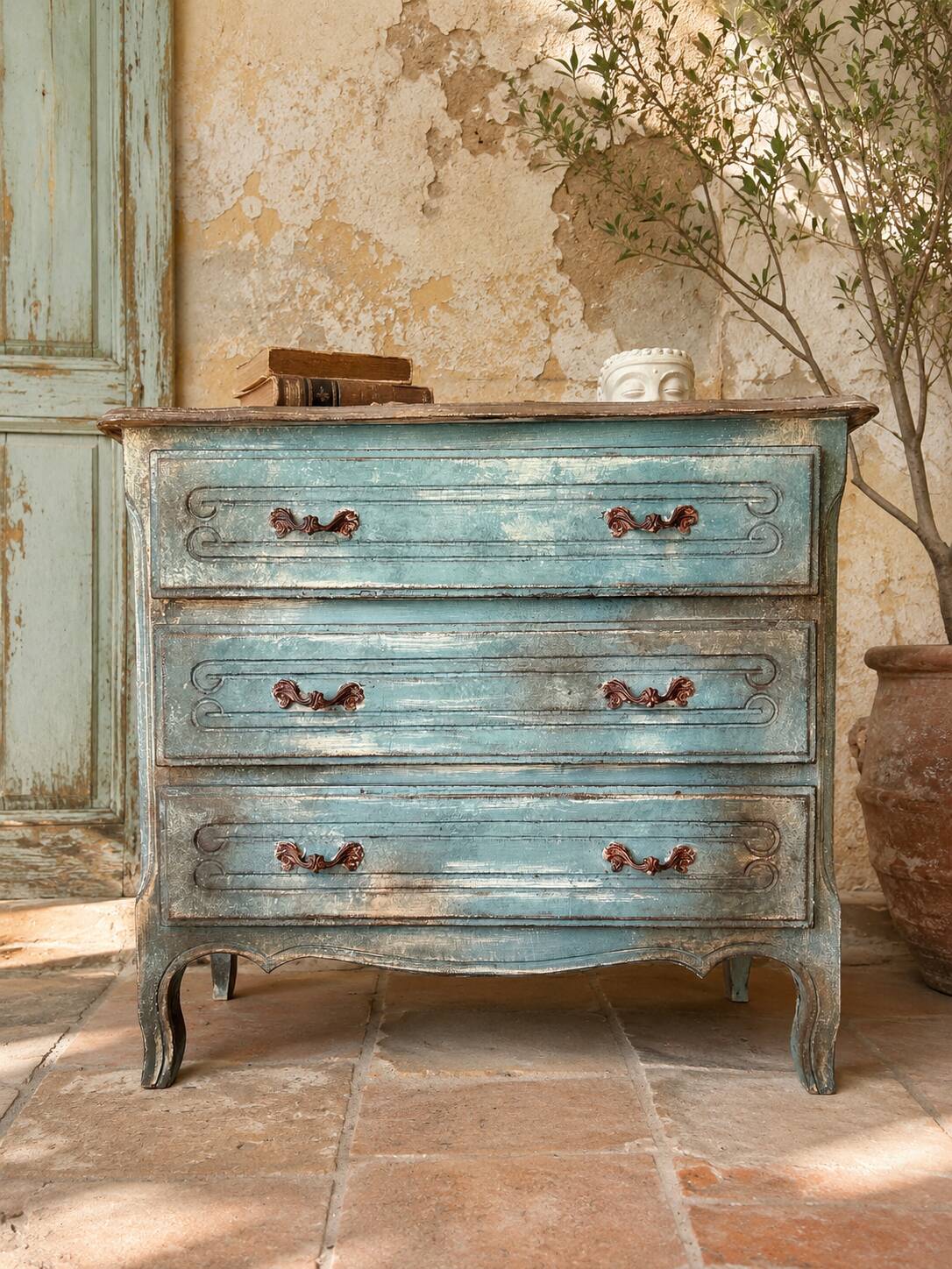 Antique commode with a patina in the Tuscan technique.