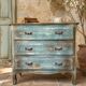 Antique commode with a patina in the Tuscan technique.