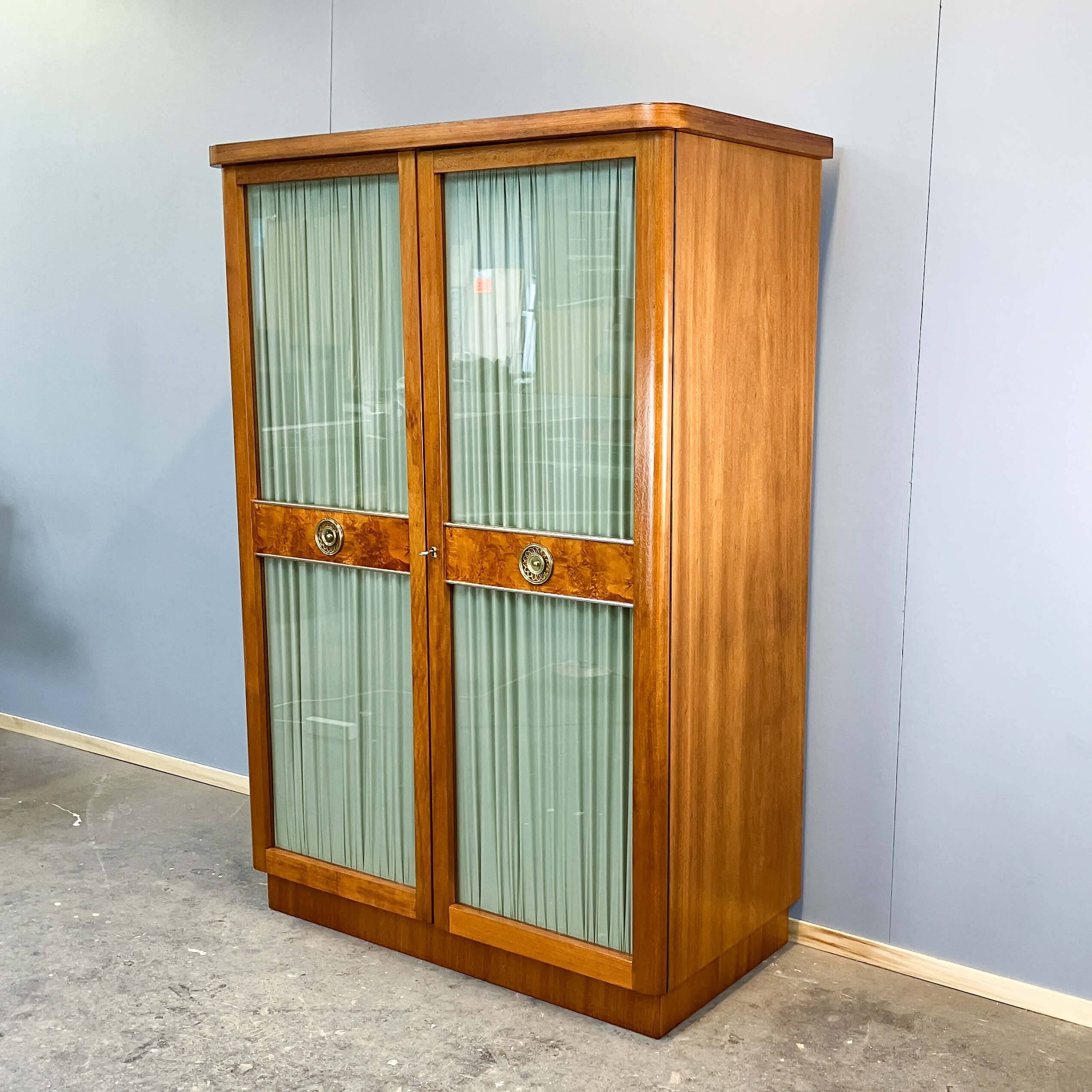 Art Deco cabinet with glass doors, various woods, 1930s