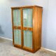 Art Deco cabinet with glass doors, various woods, 1930s