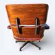 Original Eames lounge chair by Herman Miller in burgundy rosewood.