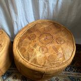 Pair of leather poufs
