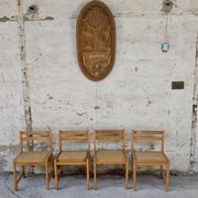 Série de 4 chaises vintage en pin assise cannage