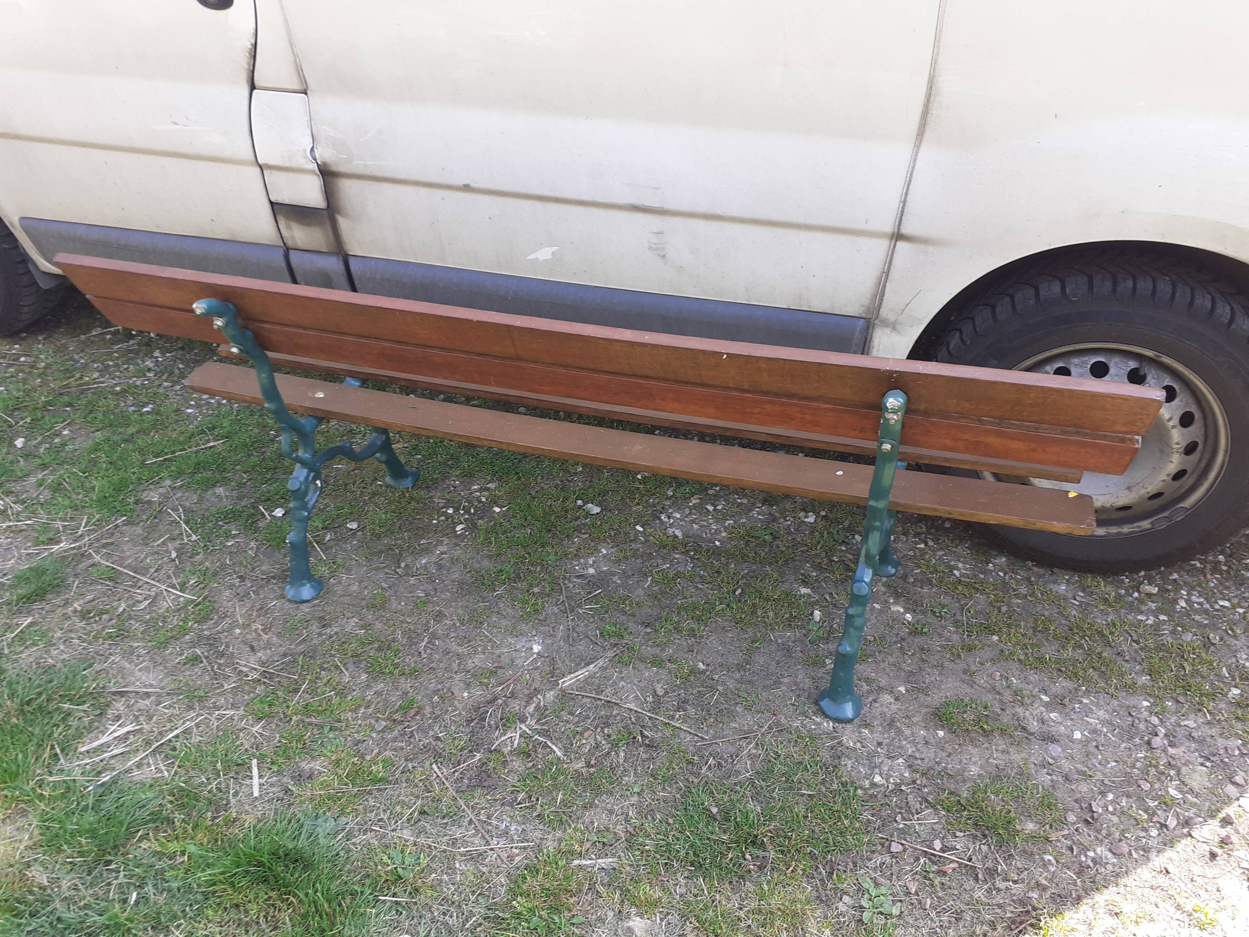 Old garden bench with cast iron feet