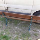 Old garden bench with cast iron feet
