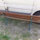 Old garden bench with cast iron feet