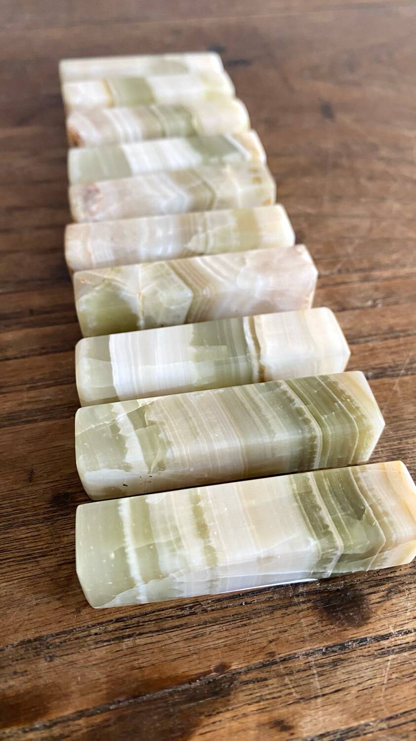 Minimalist knife rests in natural stone