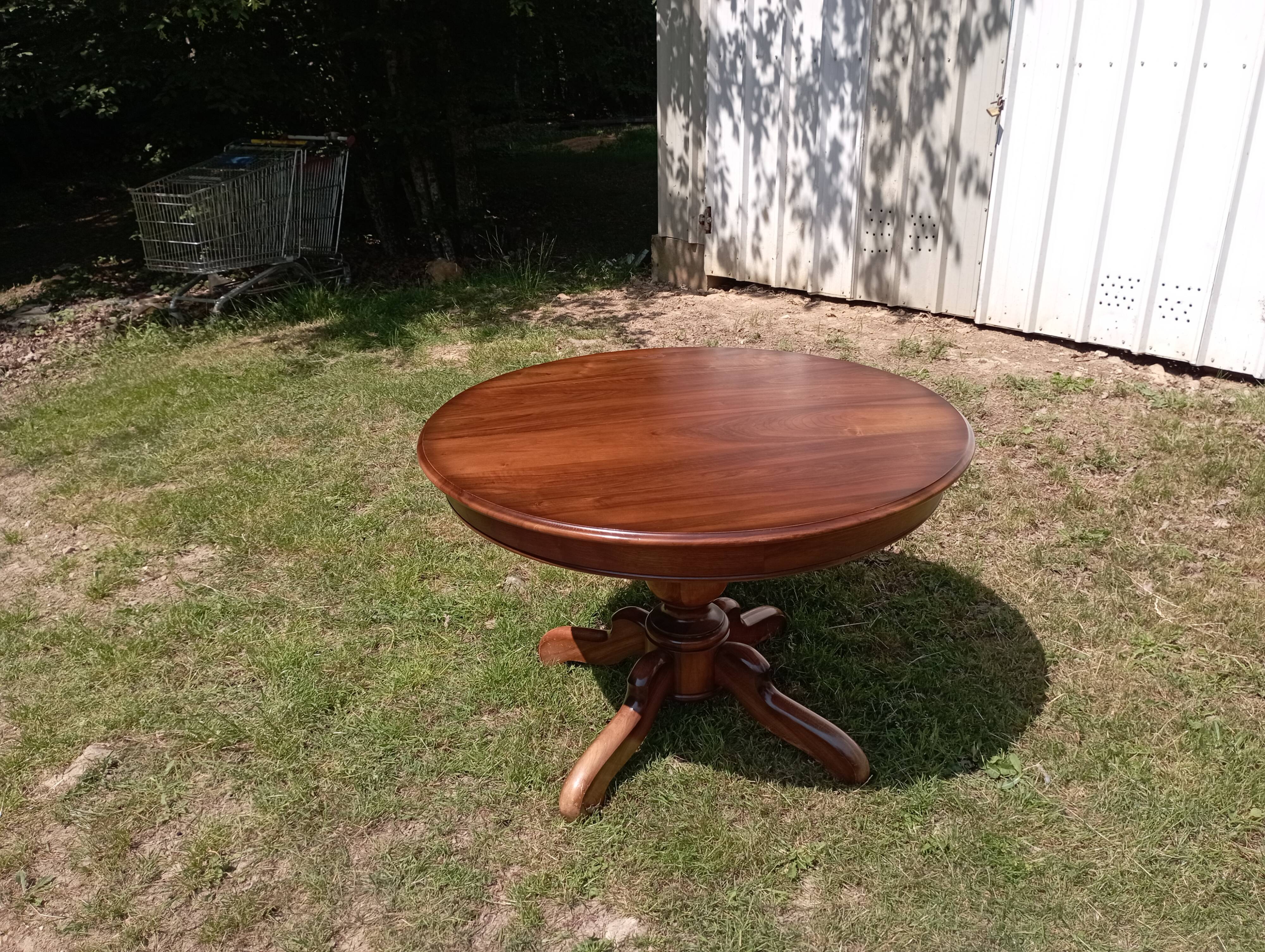 Walnut pedestal table from Briat furniture