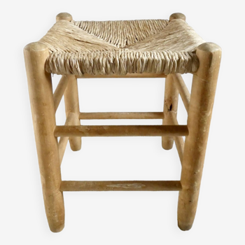 Tabouret en bois clair et assise paillée