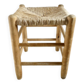 Tabouret en bois clair et assise paillée