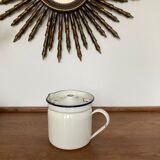 Vintage enamelled iron pitcher