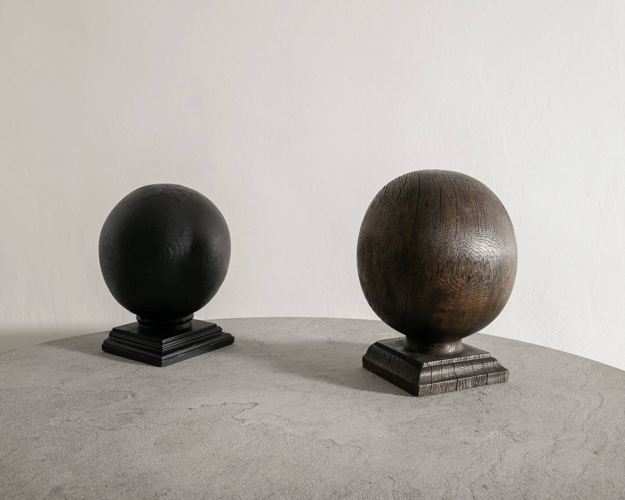 Pair of Vintage Black & Brown Round Wooden Sculptures