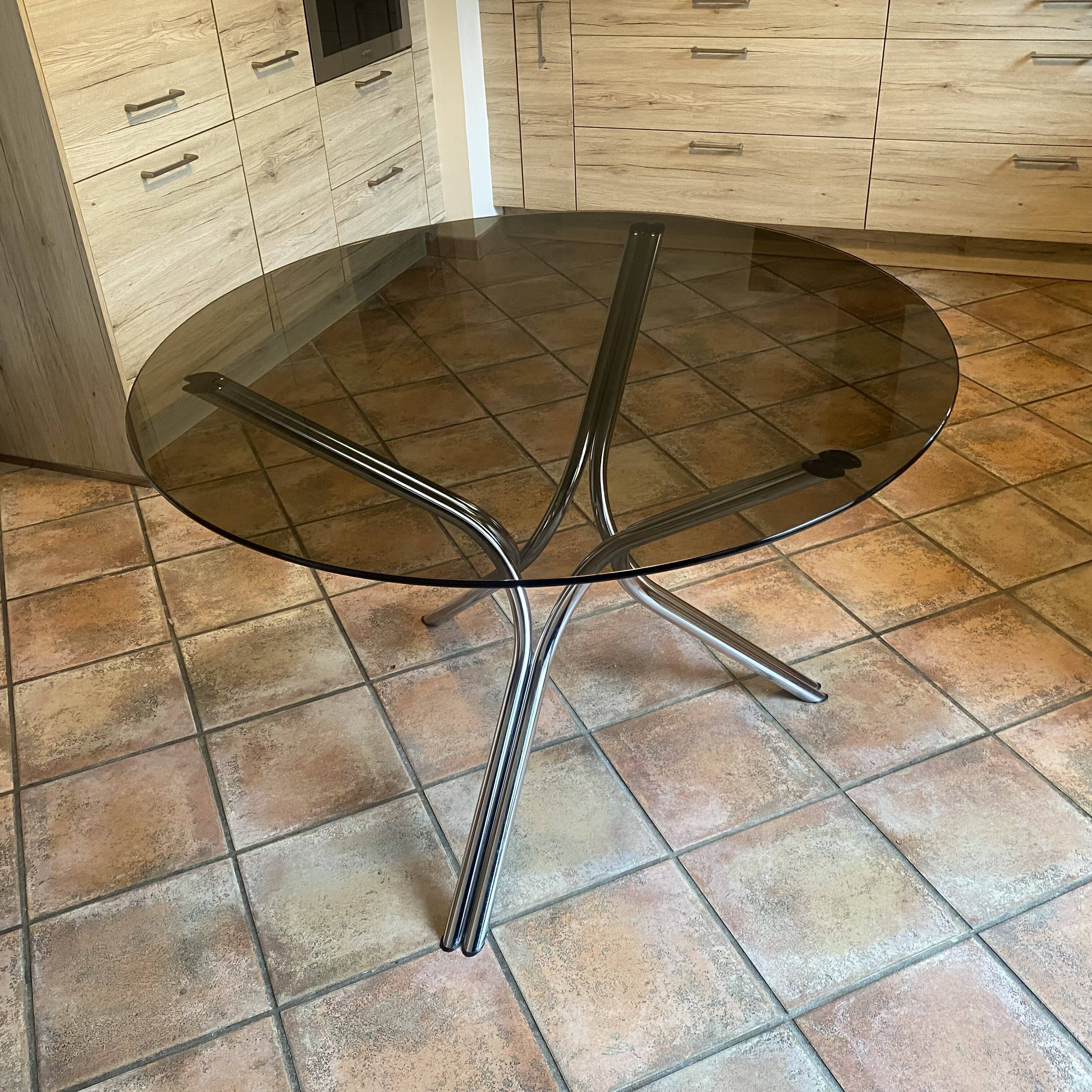 Tripod table Roche Bobois. 1970. Chrome and smoked glass.