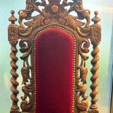Pair of Louis XIII style armchairs in carved wood