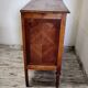 Antique marquetry commode in the Louis XVI style.