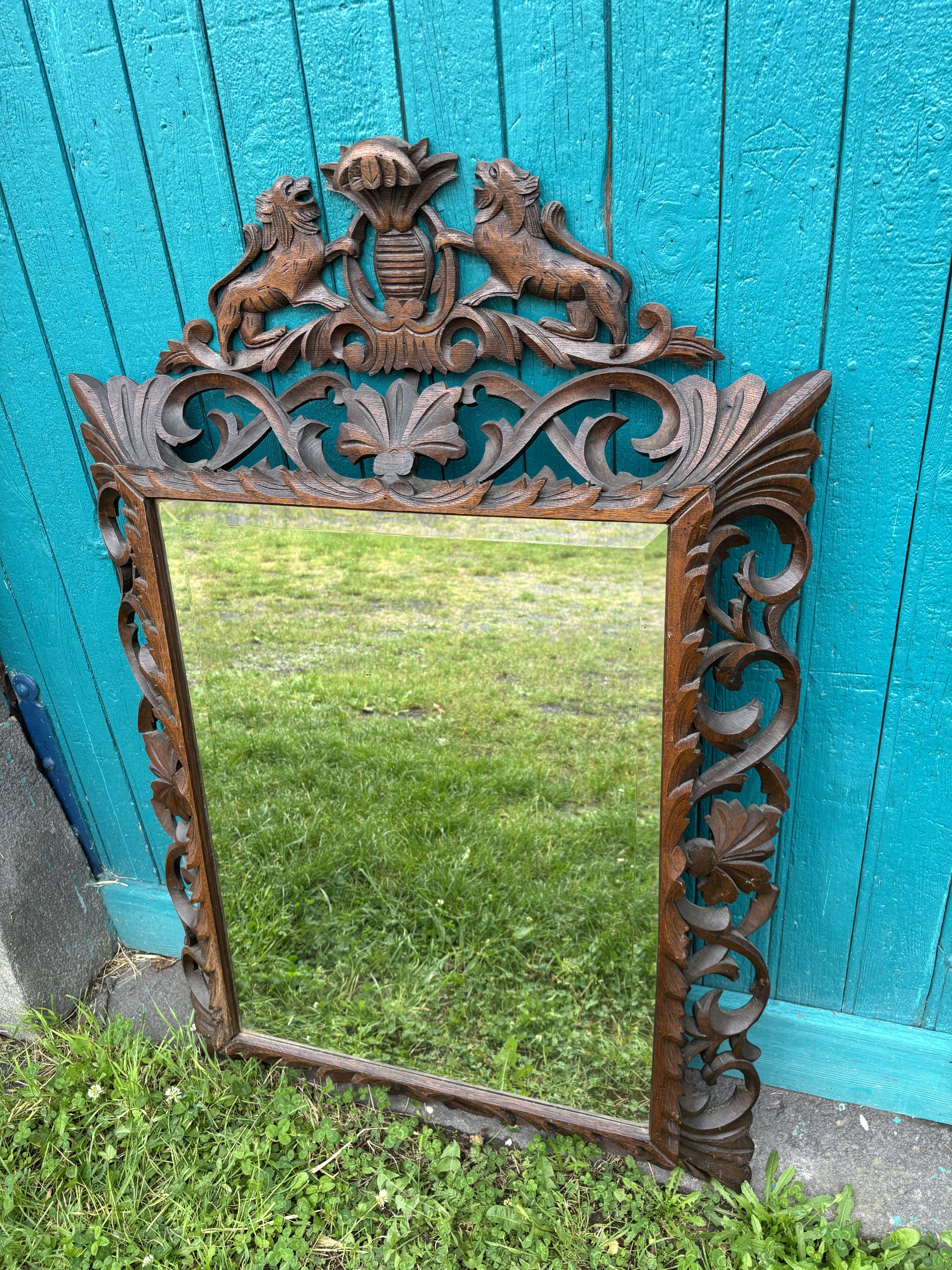 Carved wooden mirror, 19th century vintage.