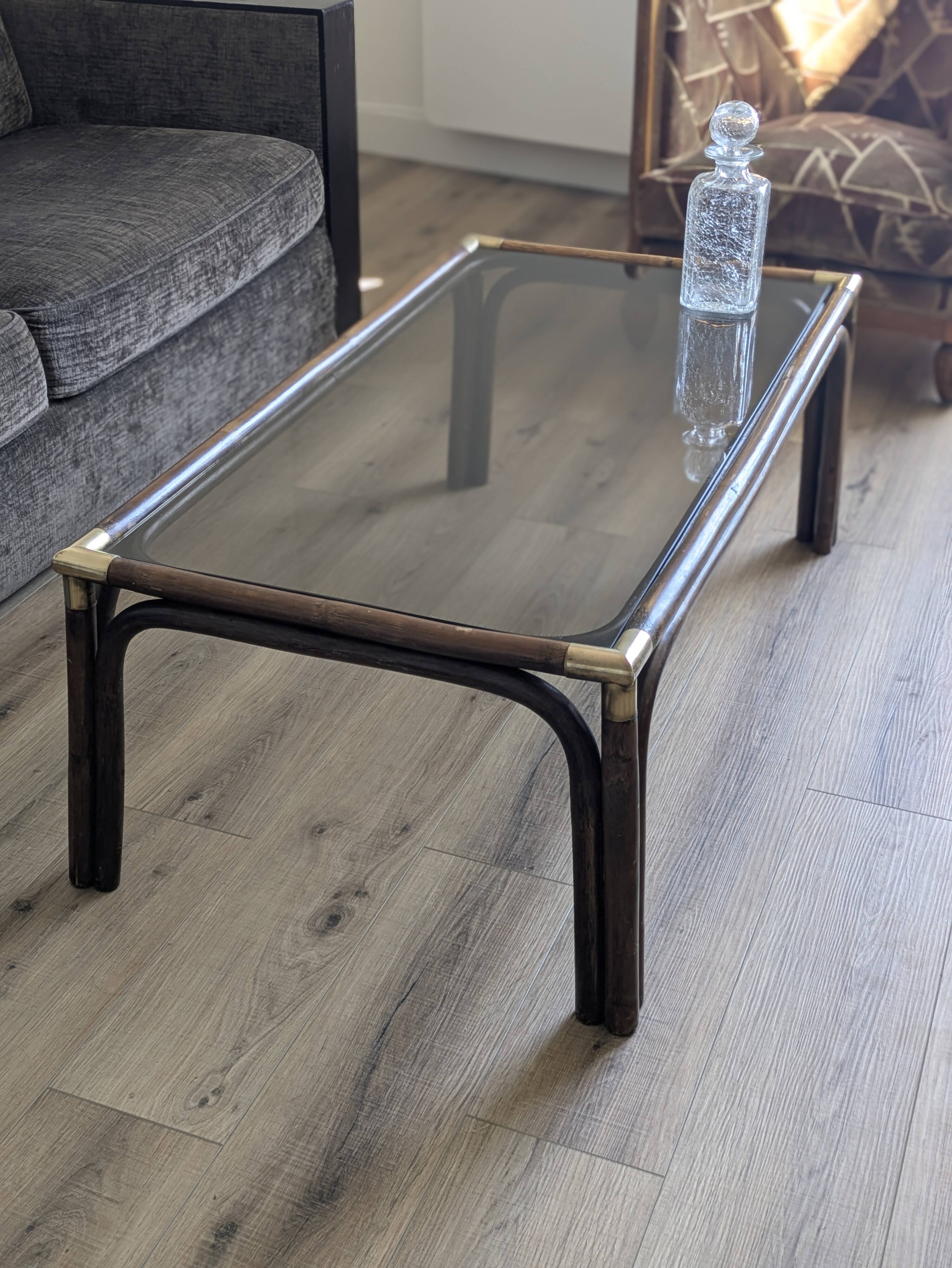 Bamboo coffee table with brass corners and smoked glass