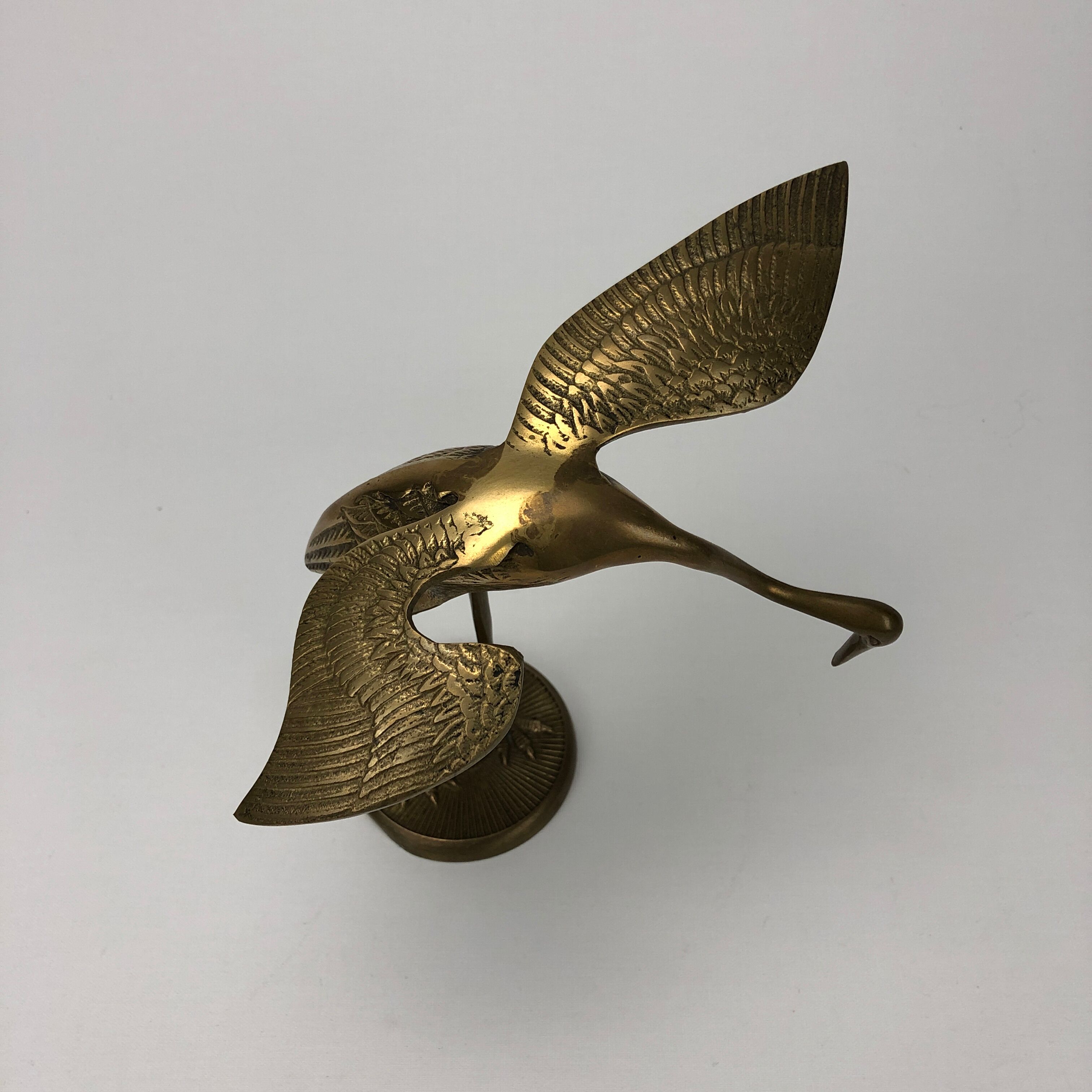 Brass heron couple