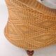 Pair of woven wicker armchairs