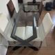 Habitat glass and wood dining table with 4 matching chairs.