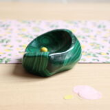 Empty brutalist pocket in malachite