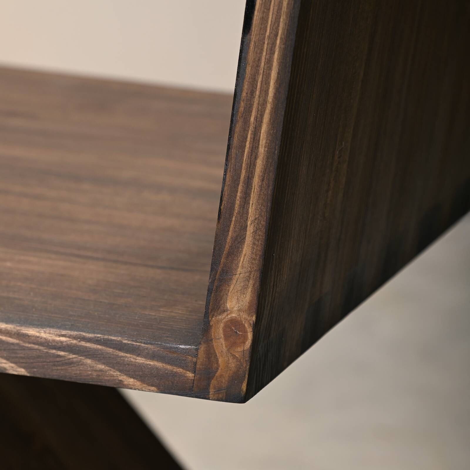 Gerrit Rietveld Zig Zag Chair is dark brown stained wood