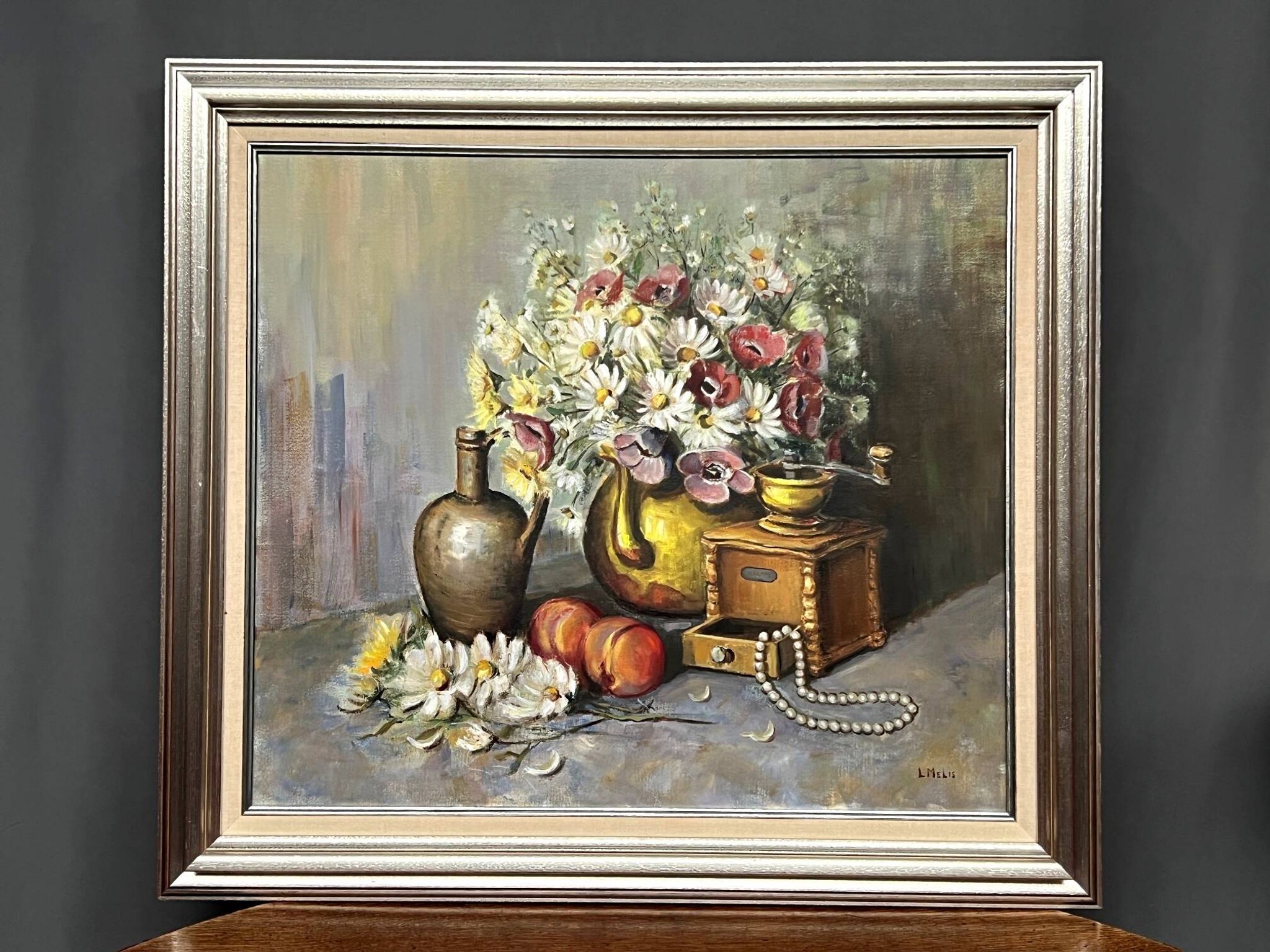 Still life with flowers and pearls signed.