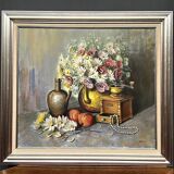Nature morte aux fleurs et perles signée.