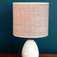 Table lamp in wool tweed and foot in cream color wood