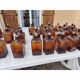 Set of 41 brown glass pharmacy bottles.