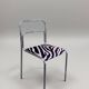 Chrome chair in Bauhaus style with zebra fabric