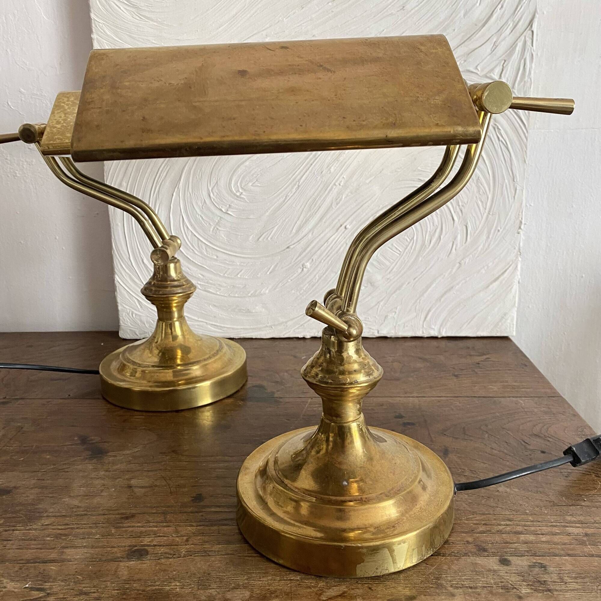 Pair of notary-style lamps in gilded metal