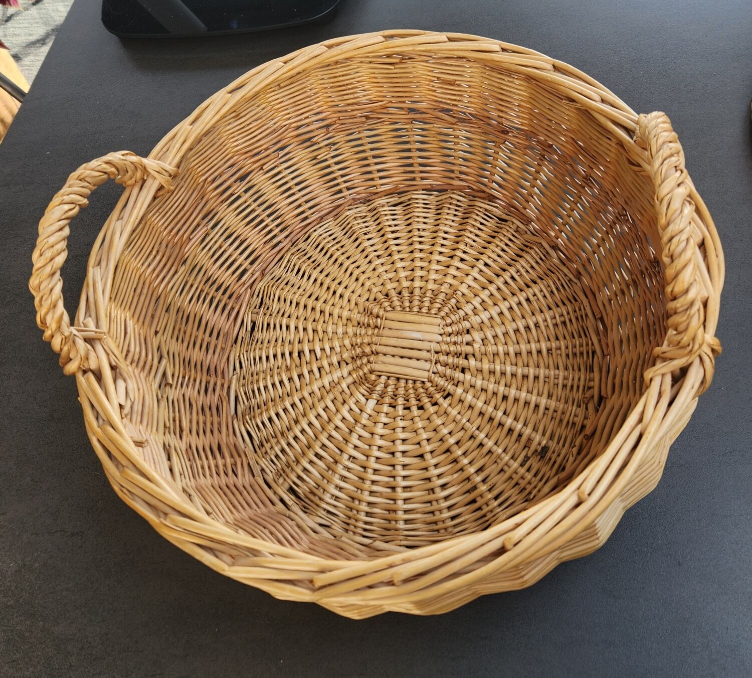 Large round wicker basket with handles