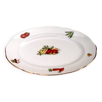 Années 1950  Plat de service de forme ovale  Faïence à décor de légumes