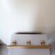Old wall coat rack in raw wood